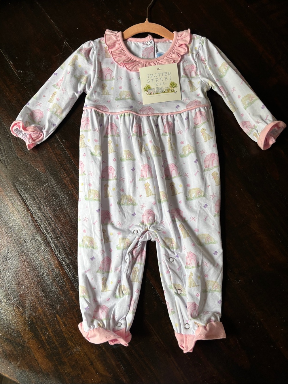 Trotters Pink Ruffle Collar Infant Romper with Pastel Print